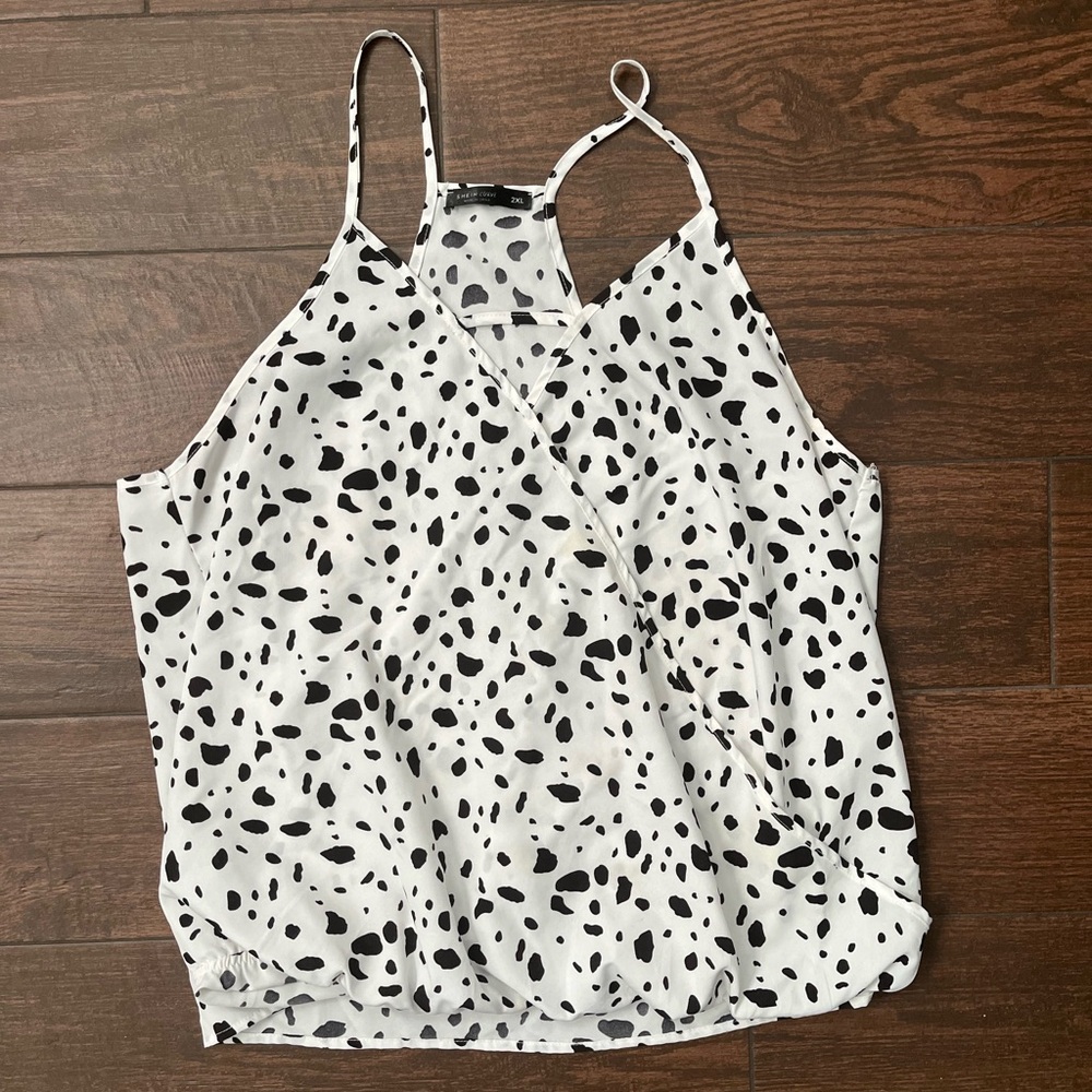 White and black polka dot camisole sleeves-less blouse